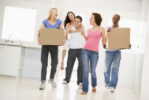 Staff preparing desks and boxes for office removals in Tulsehill