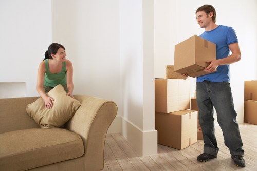 Professional movers navigating a residential street in Tulsehill